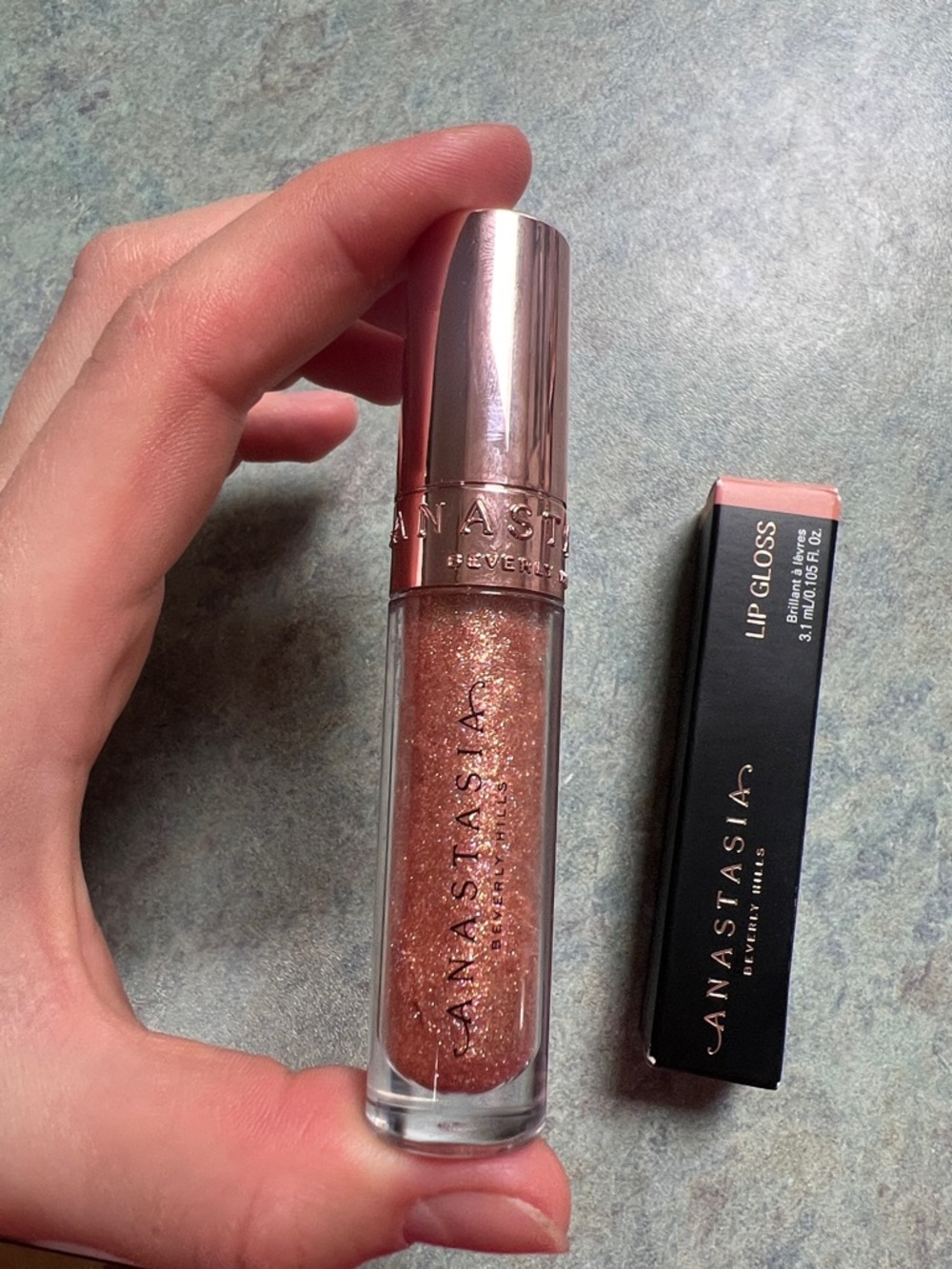 Anastasia Beverly Hills Glitter Lip Gloss in shade Amber Sparkle